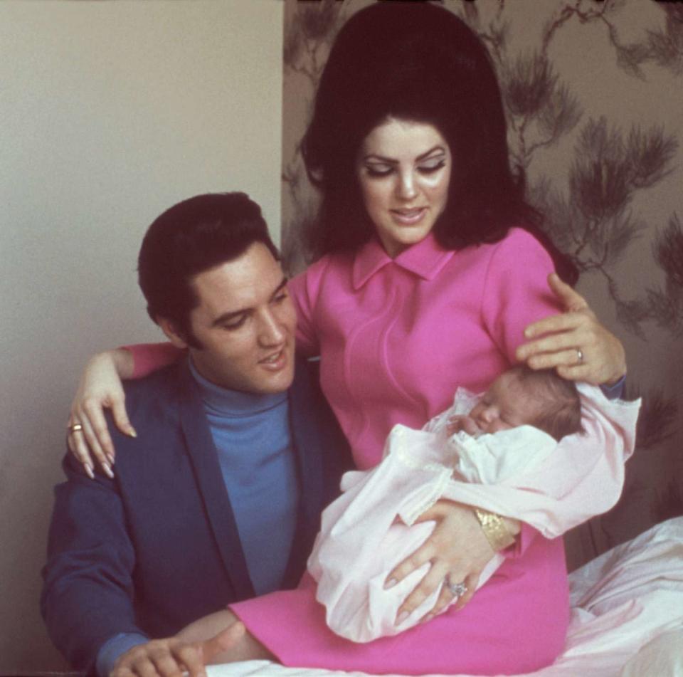 Elvis Presley with his wife Priscilla Beaulieu Presley and their 4 day old daughter Lisa Marie Presley on February 5, 1968 in Memphis, Tennessee