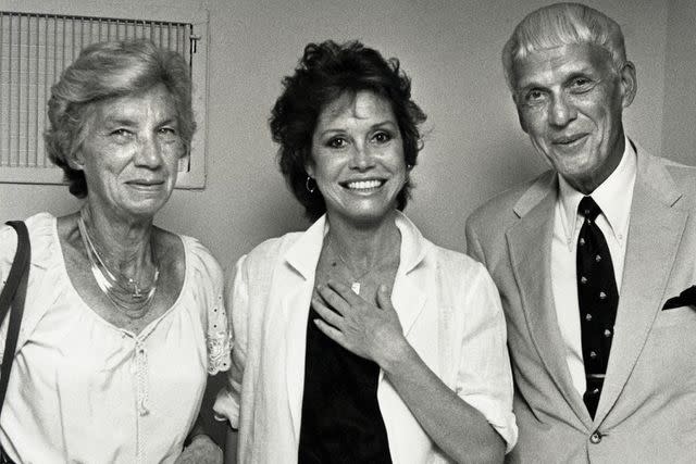 <p>Ron Galella/Ron Galella Collection via Getty</p> Mary Tyler Moore with her parents in 1981
