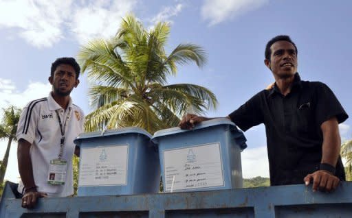 East Timorese election officials prepare to distribute ballot boxes in Dili. Former military commander Taur Matan Ruak was ahead in an early count for East Timor's presidential run-off vote on Monday, according to the elections secretariat