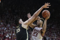 Indiana's Trayce Jackson-Davis (23) shoots against Purdue's Zach Edey (15)[ during the second half of an NCAA college basketball game, Saturday, Feb. 4, 2023, in Bloomington, Ind. (AP Photo/Darron Cummings)