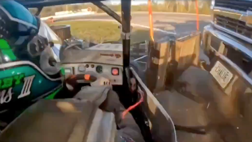 in car footage of a super mod being hit by a push truck