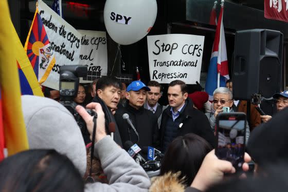 Zhou Fengsuo speaks as Rep. Mike Gallagher looks on. (Photo by Haley Byrd Wilt)