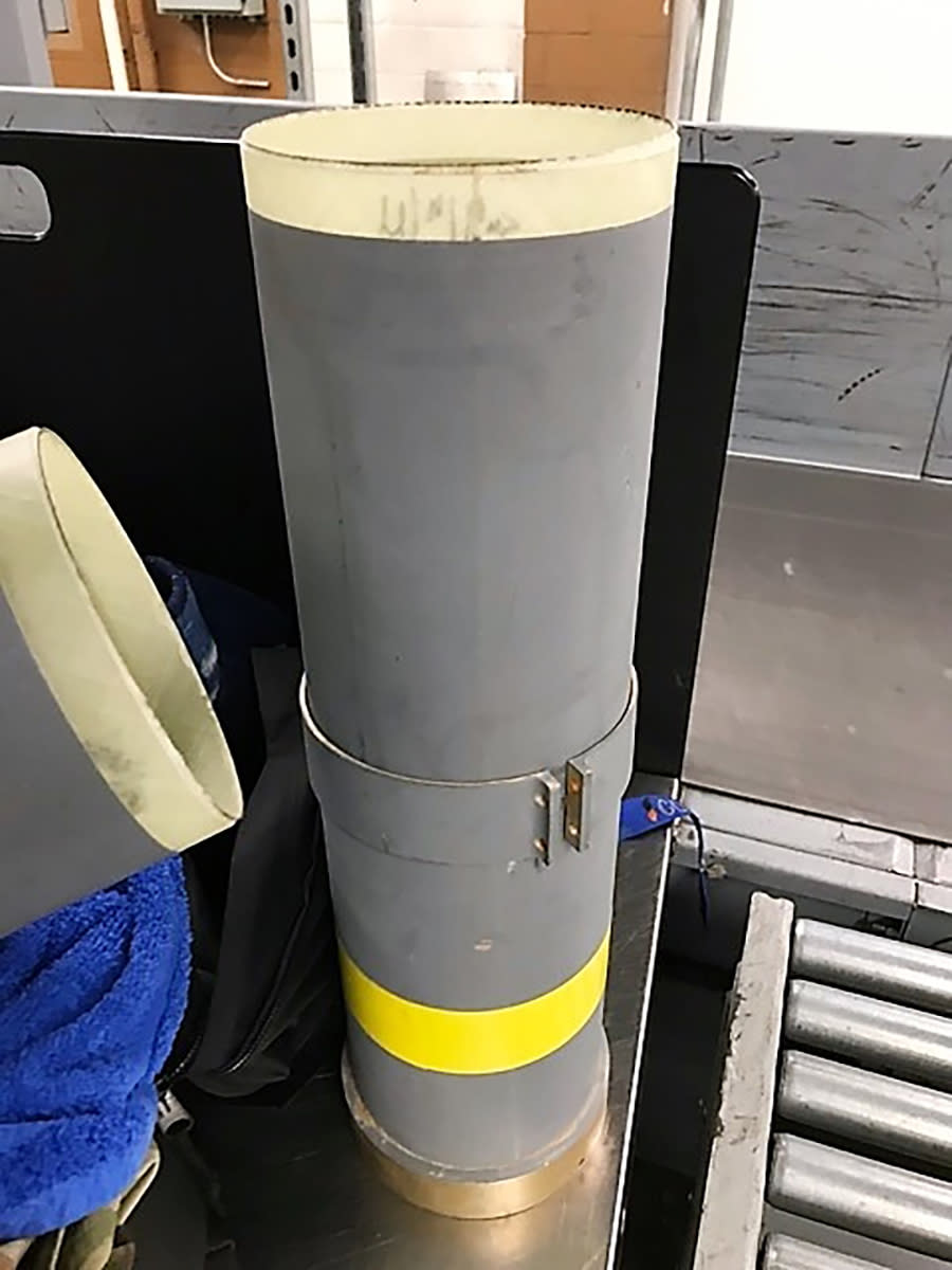 In this July 2019 photo released by the The Transportation Security Administration, a section of a missile launcher is seen at Baltimore/Washington International Thurgood Marshall Airport near Baltimore. Federal officials say they've found a missile launcher in a man's luggage at the airport in Baltimore. The unidentified traveler said he was in the military and coming home from Kuwait and said he wanted to keep the weapon as a souvenir. (Transportation Security Administration via AP)