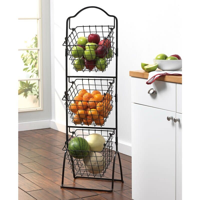 Take the farmers market indoors with this three-tier metal basket that can hold all your fresh fruits and veggies. It has an antique black finish that will look better with a little wear. <a href="https://fave.co/34cPyNZ" target="_blank" rel="noopener noreferrer">Find it for $60 at Wayfair</a>.