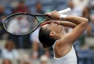 Flavia Pennetta of Italy reacts after defeating Simona Halep of Romania in their women's singles semi-final match at the U.S. Open Championships tennis tournament in New York, September 11, 2015. REUTERS/Mike Segar Picture Supplied by Action Images