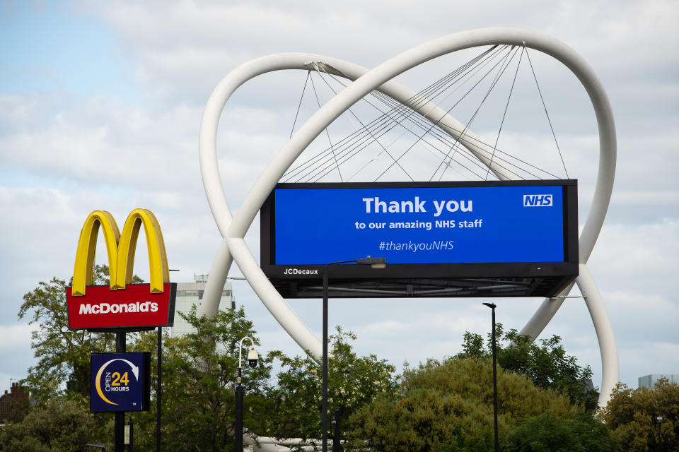 Signs for McDonald's and The NHS on display at Wandsworth roundabout as the UK continues in lockdown to help curb the spread of the coronavirus.