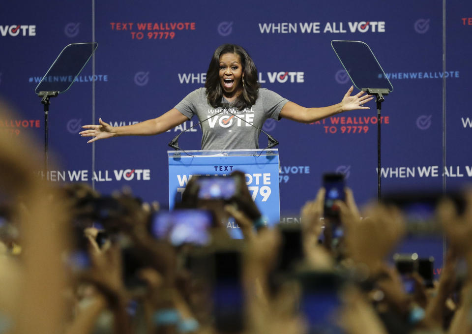 Former first lady Michelle Obama speaks at a rally to encourage voter registration on Friday, Sept. 28, 2018, in Coral Gables, Fla. (AP Photo/Brynn Anderson)