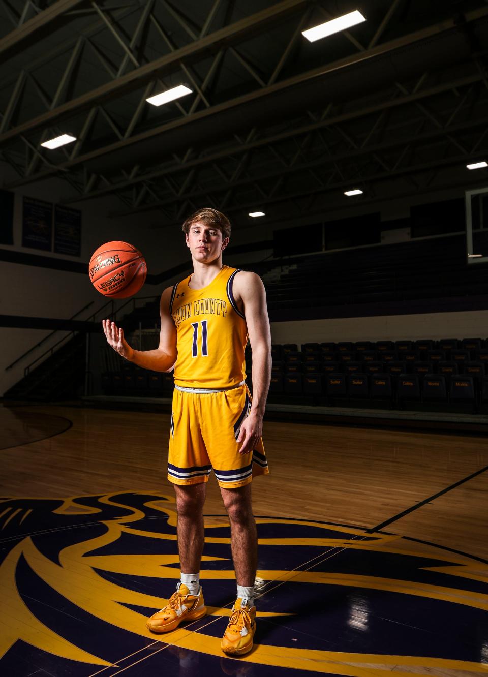 Travis Perry, a junior guard for Lyon County High School boys basketball has 4,.317 points so far.  He needs 21 points to pass the record of 4,337 set by"King" Kelly Coleman established in 1956. He has been averaging 32.2 points per game and a state best 167 3-point shots this 2022-23 season. March 14, 2023. 