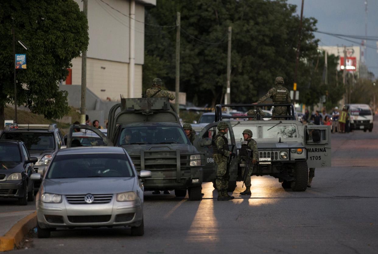 Mexico Cancun shooting police soldiers