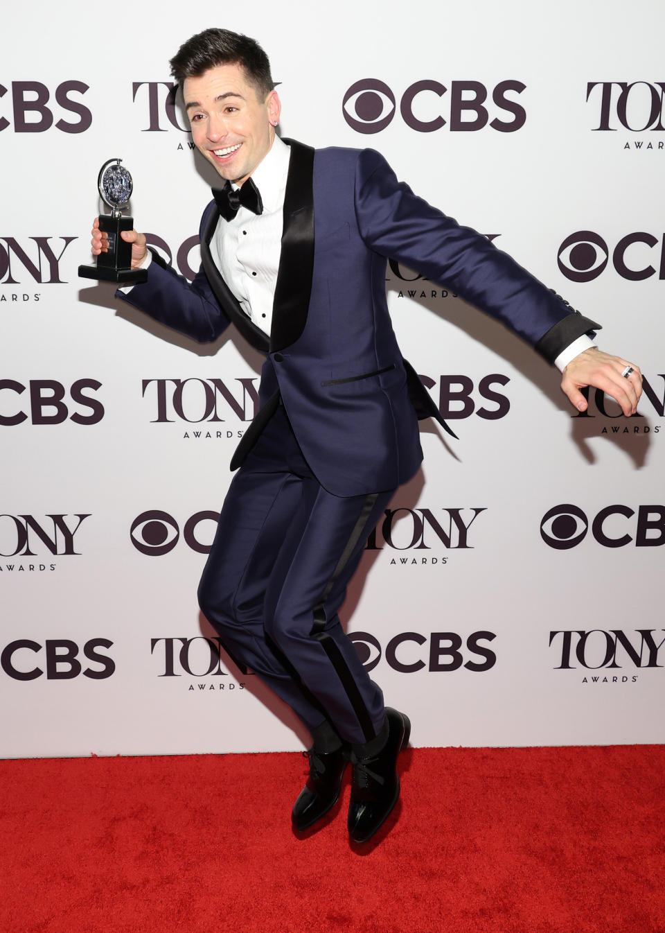 Matt Doyle celebrates with his Tony Award for best actor in a featured role in a musical on June 12. (Cindy Ord / Getty Images)