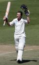 New Zealand's BJ Watling acknowledges his 100 against India during the second innings on day four of the second international test cricket match at the Basin Reserve in Wellington, February 17, 2014.