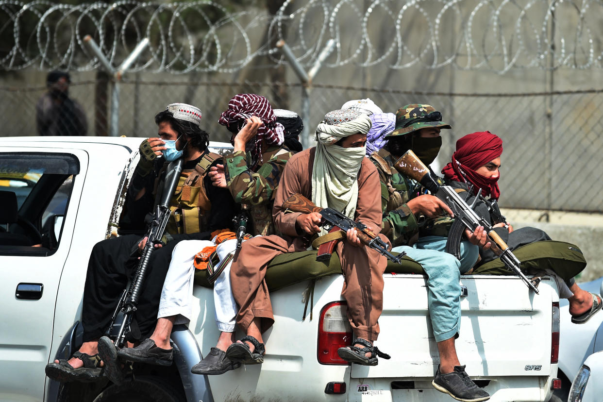 TOPSHOT - Taliban fighters guard outside the airport in Kabul on August 31, 2021, after the US has pulled all its troops out of the country to end a brutal 20-year war -- one that started and ended with the hardline Islamist in power. (Photo by Wakil KOHSAR / AFP) (Photo by WAKIL KOHSAR/AFP via Getty Images)