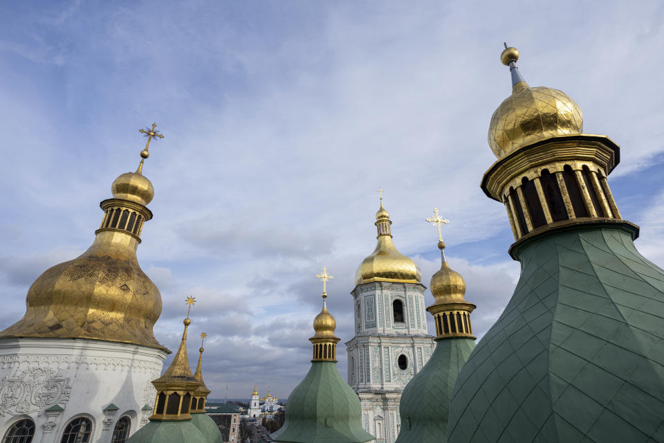 The Saint Sophia Cathedral in Kyiv, Ukraine, Thursday, Dec. 21, 2023. A UNESCO World Heritage site, the gold-domed St. Sophia Cathedral, located in the heart of Kyiv, was built in the 11th century and designed to rival the Hagia Sophia in Istanbul. The monument to Byzantine art contains the biggest collection of mosaics and frescoes from that period, and is surrounded by monastic buildings dating back to the 17th century. (AP Photo/Evgeniy Maloletka)