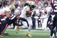 New Orleans Saints running back Alvin Kamara (41) runs for a gain during the first half of an NFL football game against the New England Patriots, Sunday, Sept. 26, 2021, in Foxborough, Mass. (AP Photo/Steven Senne)