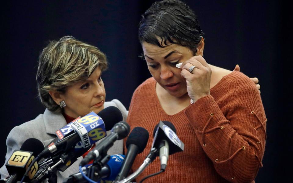 Allred comforts Cosby victim Chelan Lasha during a press conference after his sentencing -  AP