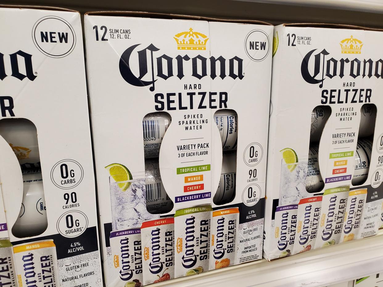 Close-up of packages of Corona brand hard seltzer, an alcoholic seltzer water drink, on store shelves in San Ramon, California, July, 2020. (Photo by Smith Collection/Gado/Getty Images)