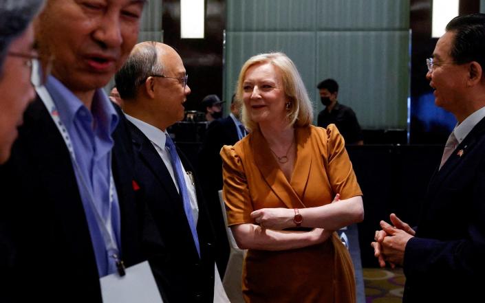 Liz Truss, the former prime minister, talks with Taiwanese officials in Taipei, Tawian, today - Ann Wang/Reuters 