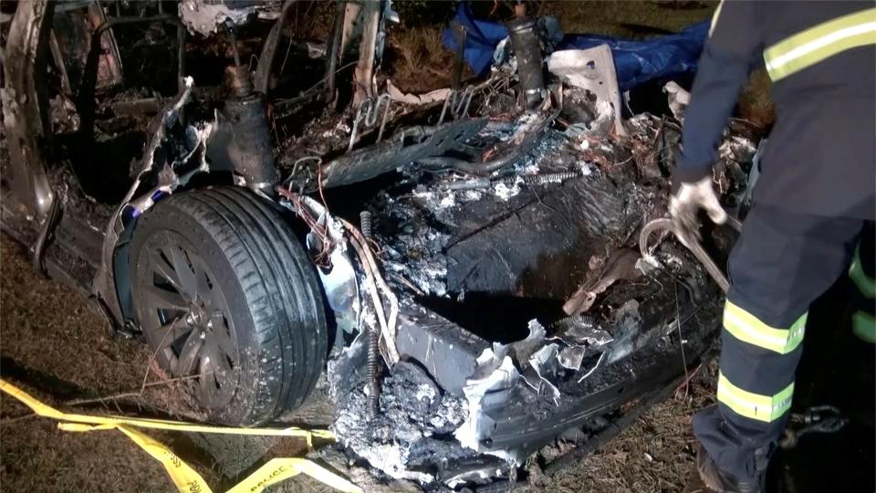 The remains of a Tesla vehicle are seen after it crashed in an area of Texas on Saturday (via REUTERS)