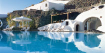 <p><b>10. Perivolas</b></p>Located in Santorini, Greece, the Perivolas Hotel is the tenth best hotel in the world according to the Conde Nast Traveler survey. This charming and intimate hotel is the perfect place to relax and enjoy elegant simplicity of island living.<p>Readers’ Choice Rating: 98.1</p><p>Room: 98.3</p><p>Service: 100</p><p>Food: 95.8</p><p>Location: 100</p><p>Design: 98.3</p><p>Activities: 95.7</p><p>(Image source: Hotel Website)</p>