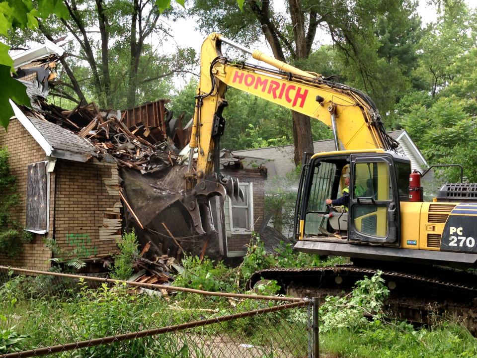 Blighted homes dotted throughout Detroit neighborhoods complicate life for neighbors.