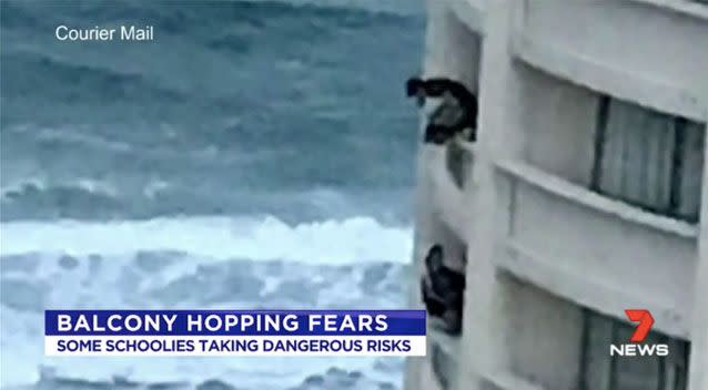 Teens have been seen risking lives over hotel balconies. Source: 7 News/ Courier Mail