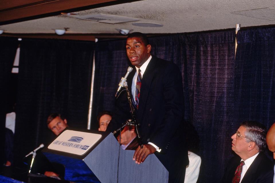 Magic Johnson reveals during a press conference that he has the HIV virus.