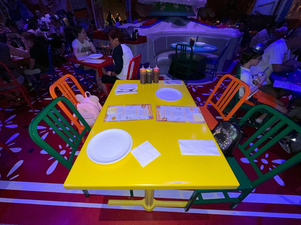 colorful table and chairs insider roundup rodeo bbq at hollywood studios