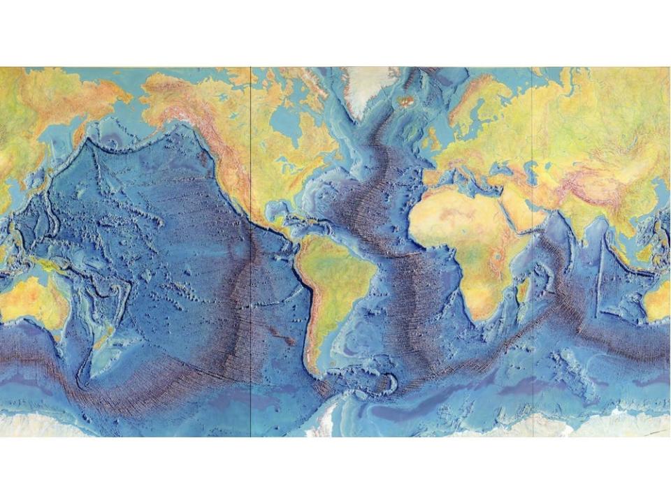 A colorful world map by Heezen, Tharp, and Berann showing the ocean floor's mountain ranges and rift valleys