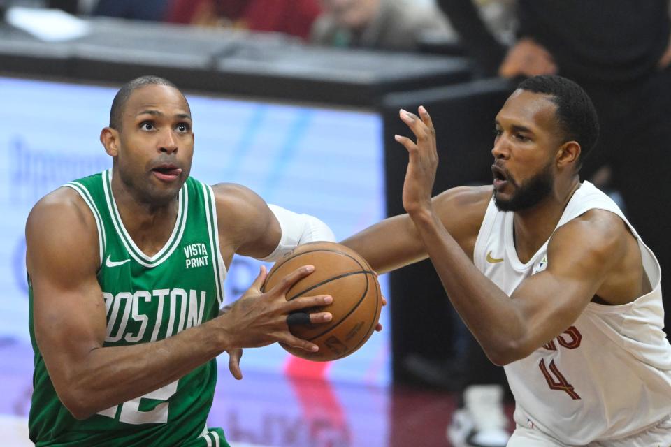 Celtics center Al Horford looks to the basket against Cavaliers forward Evan Mobley in the first quarter of Game 4 of the Eastern Conference semifinals, May 13, 2024, in Cleveland.