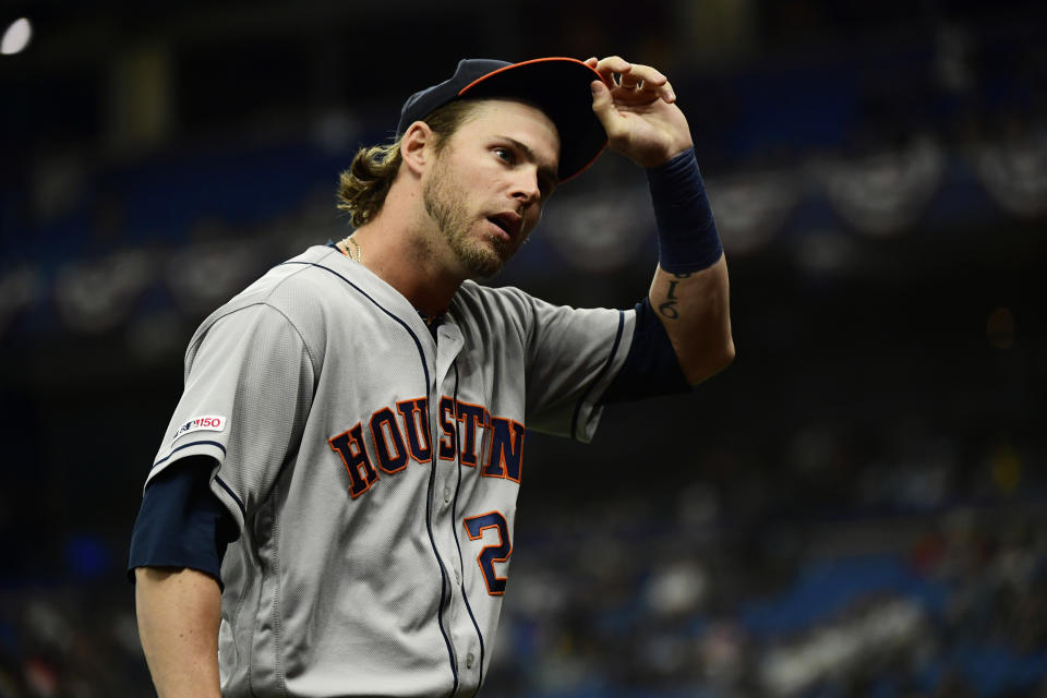 Josh Reddick is angry over the"absurd" schedule that had the Astros traveling between night games. (Getty)