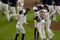 The Houston Astros celebrate their win against the Boston Red Sox in Game 6 of baseball's American League Championship Series Friday, Oct. 22, 2021, in Houston. The Astros won 5-0, to win the ALCS series in game six. (AP Photo/Sue Ogrocki)