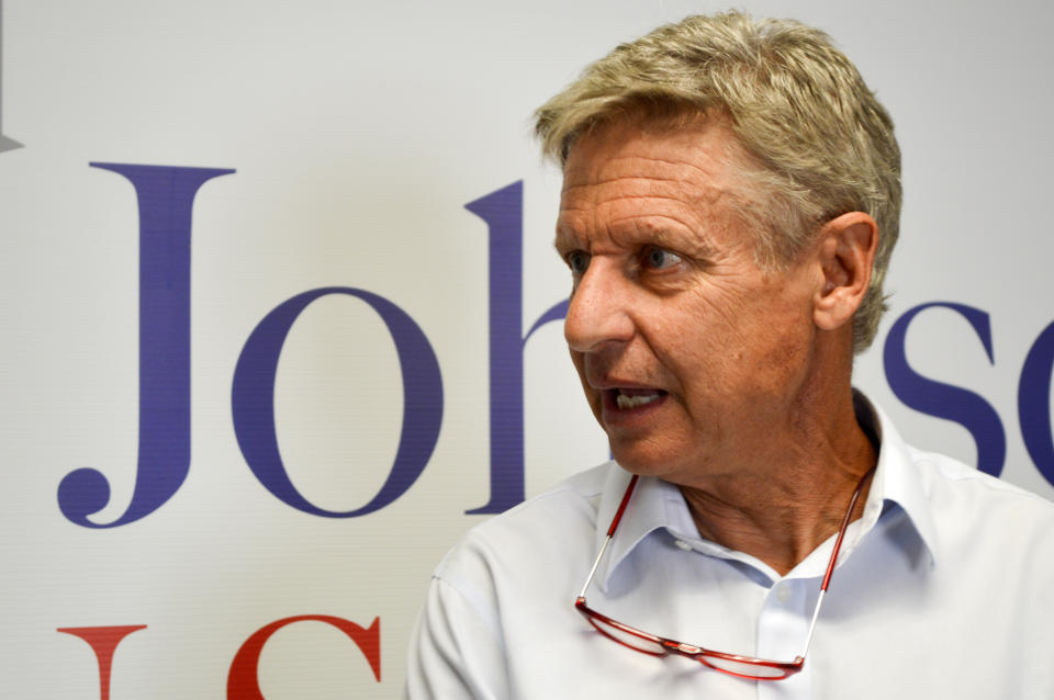 Former Libertarian presidential candidate Gary Johnson talks to reporters on Thursday, Aug. 16, 2018, about his decision to join the U.S. Senate race in New Mexico. (AP Photo/ Russell Contreras)