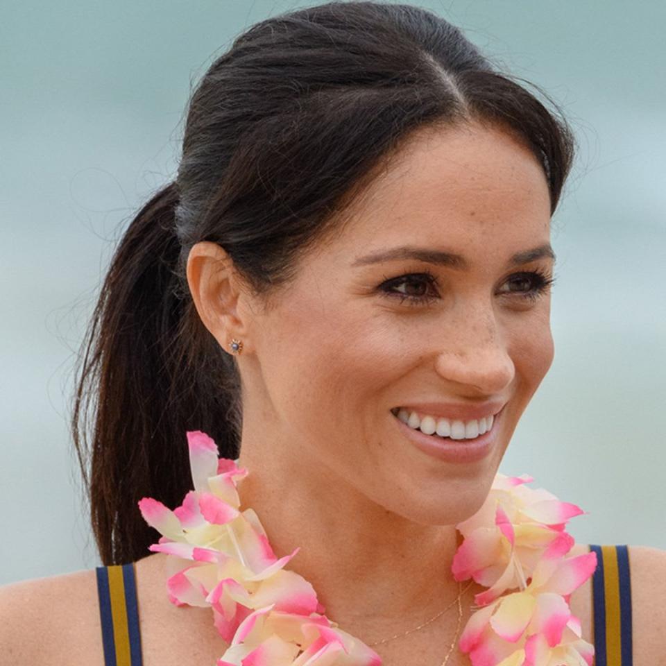 Duchess Meghan rocks scalloped swimsuit for beach date with Prince Harry