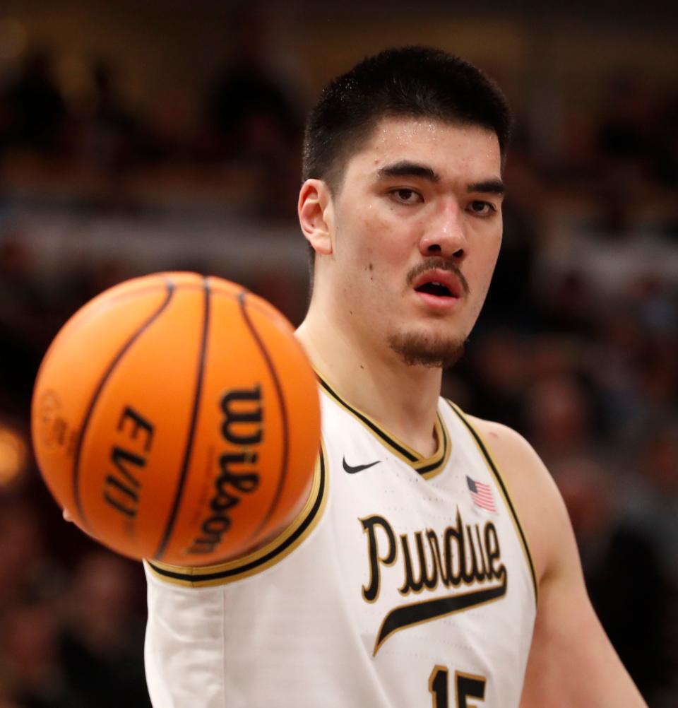 Purdue Boilermakers center Zach Edey (15) passes the ball back to the referee during the Big Ten Men’s Basketball Tournament Championship game against the Penn State Nittany Lions, Sunday, March 12, 2023, at United Center in Chicago. Purdue won 67-65.