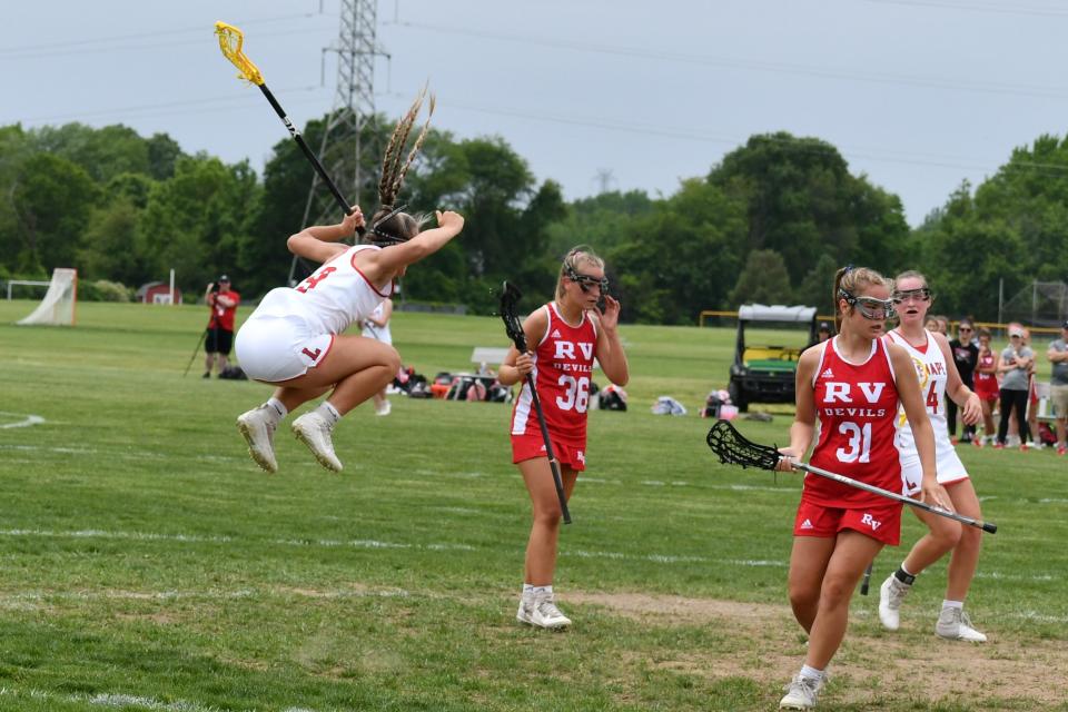 Lenape senior Gianna Monaco gets airborne to celebrate career goal No. 301, scored against Rancocas Valley