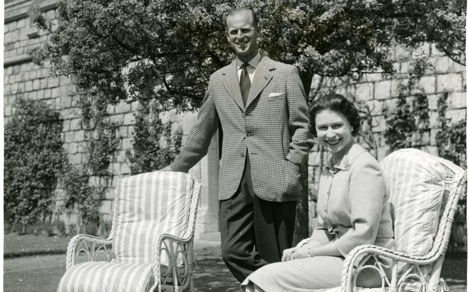 The Queen and Prince Philip on the lawn below the East Terrace in 1959 - The Times ROTA