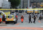 <p>Police guard close to the Manchester Arena in Manchester, Britain, Tuesday May 23, 2017, a day after an explosion. (Peter Byrne/PA via AP) </p>