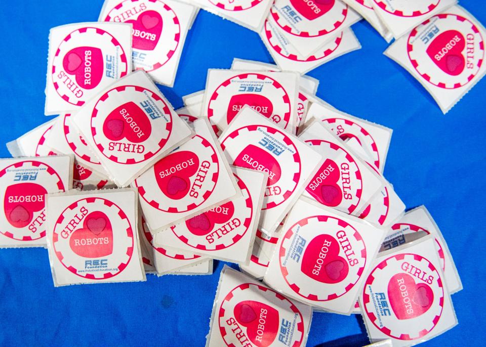 Stickers are seen on a table during the VEX Robotics Tournament hosted at York High School where 26 teams across the state of Maine competed Saturday, Nov. 13, 2021.