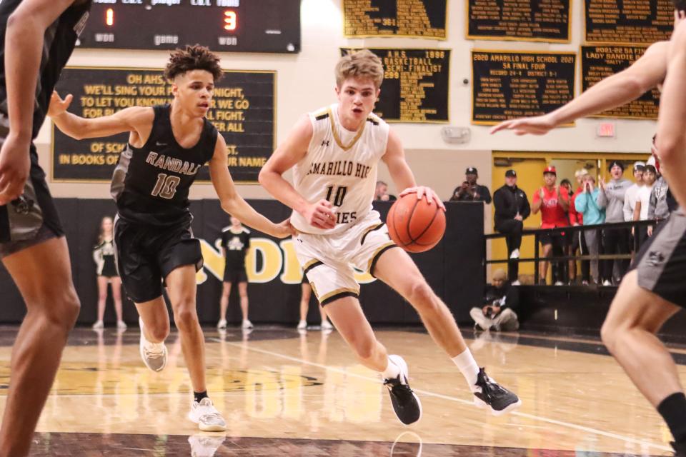 Amarillo High’s Cooper Pillion (10) drives the lane in a non district game against Randall, Tuesday, November 29, at Amarillo High School Gym, in Amarillo. Amarillo High won 65-44.