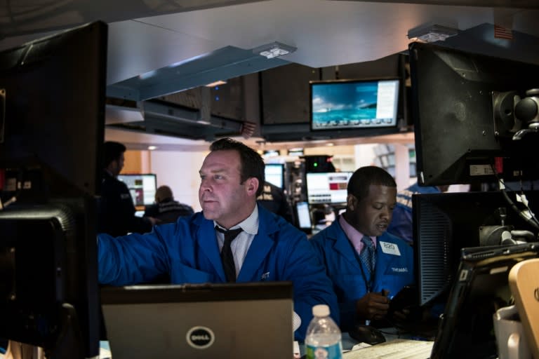 Traders work on the floor of the New York Stock Exchange on February 8, 2016 in New York