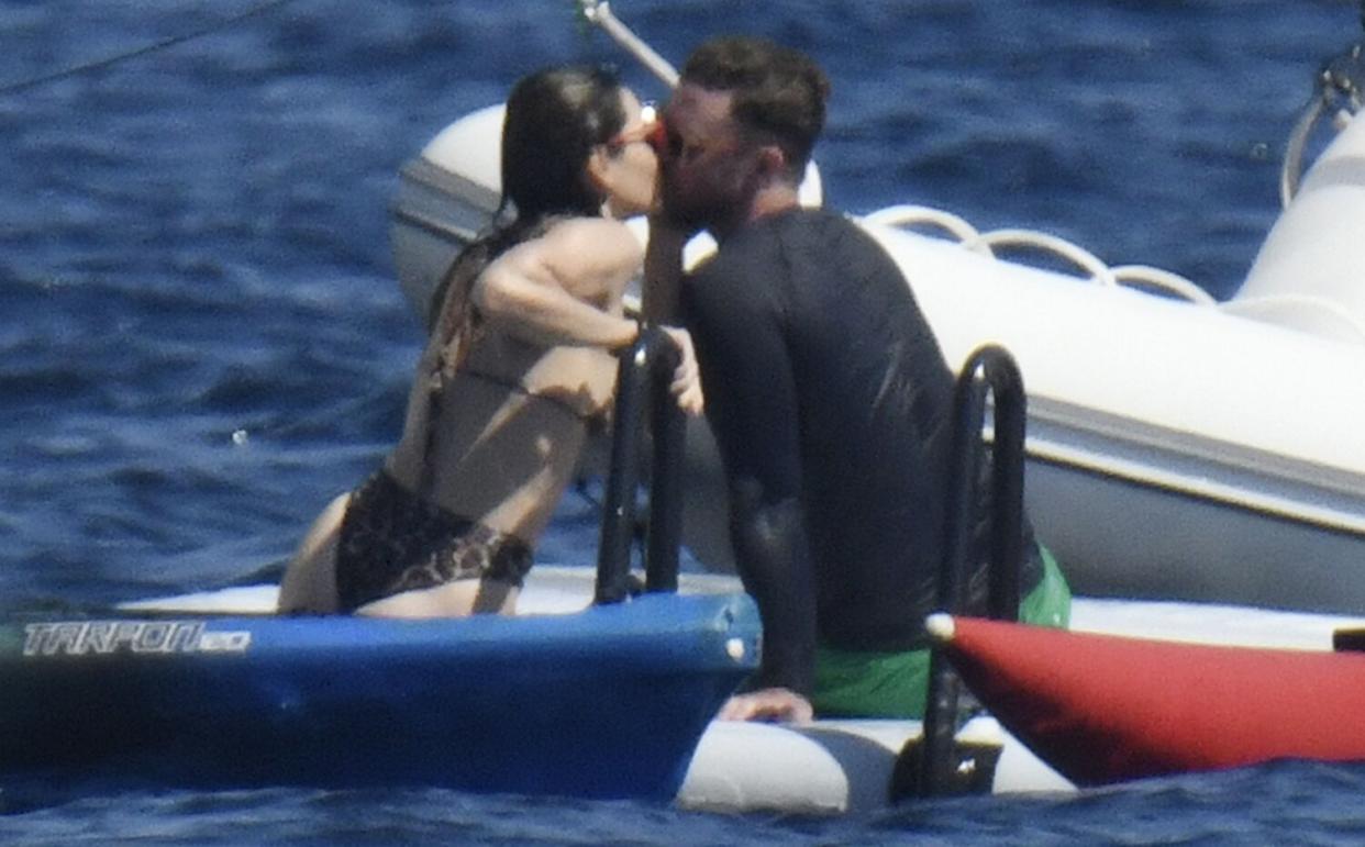 Justin Timberlake and his wife, the American Actress and bikini-clad Jessica Biel show off some PDA with a kiss out on the Mediterranean waters on their sun kissed Italian holiday