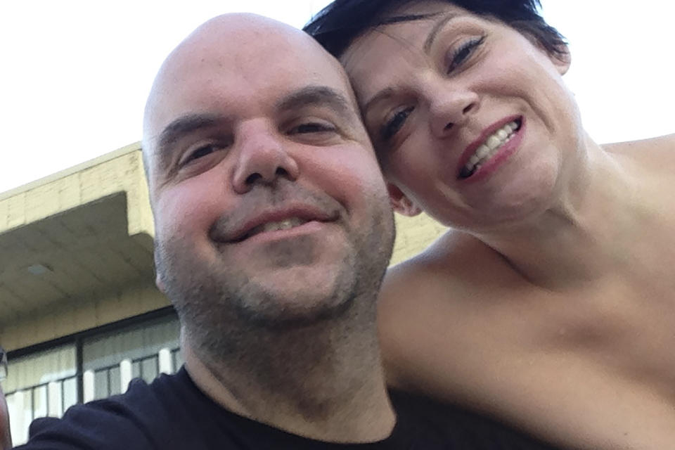 In a selfie taken in July 2014, Johnathan Walton poses with Marianne Smyth during a vacation in Palm Springs, Calif. Smyth is in a Maine jail awaiting a hearing in April 2024 that will decide whether she can be extradited to the United Kingdom over a scam dating back more than 15 years in Northern Ireland. She is accused of stealing more than $170,000 from at least five victims from 2008 to 2010 in Northern Ireland, according to court records. (Johnathan Walton via AP)