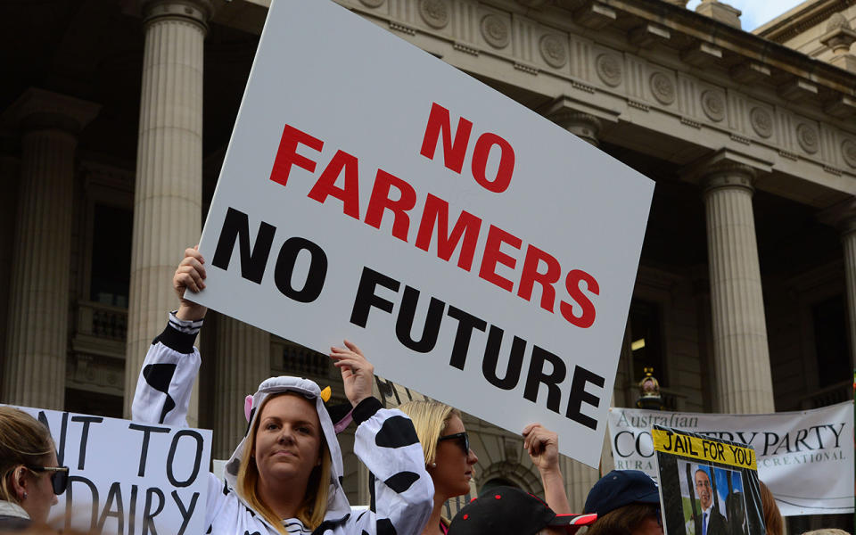 Dairy farmers rally outside Parliament House following a march in Melbourne in 2016. Source: AAP