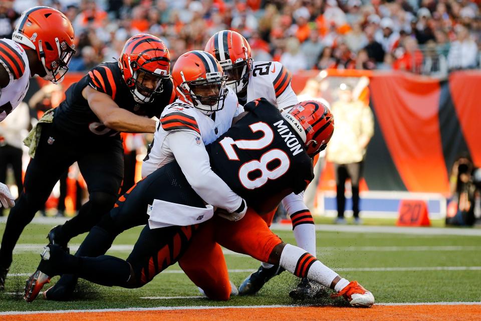 Cincinnati Bengals running back Joe Mixon (28) breaks through for a touchdown in the fourth quarter of the NFL Week 9 game between the Cincinnati Bengals and the Cleveland Browns at Paul Brown Stadium in Cincinnati on Sunday, Nov. 7, 2021. Cleveland kept a halftime lead to clinch a 41-16 win over the Bengals.

Cleveland Browns At Cincinnati Bengals Week 9