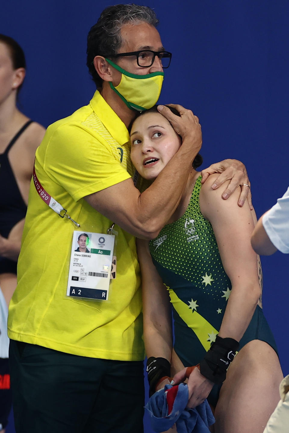 Tokyo 2020 Olympics - Diving - Women's 10m Platform - Final - Tokyo Aquatics Centre, Tokyo, Japan - August 5, 2021. Melissa Wu of Australia reacts with her coach REUTERS/Marko Djurica