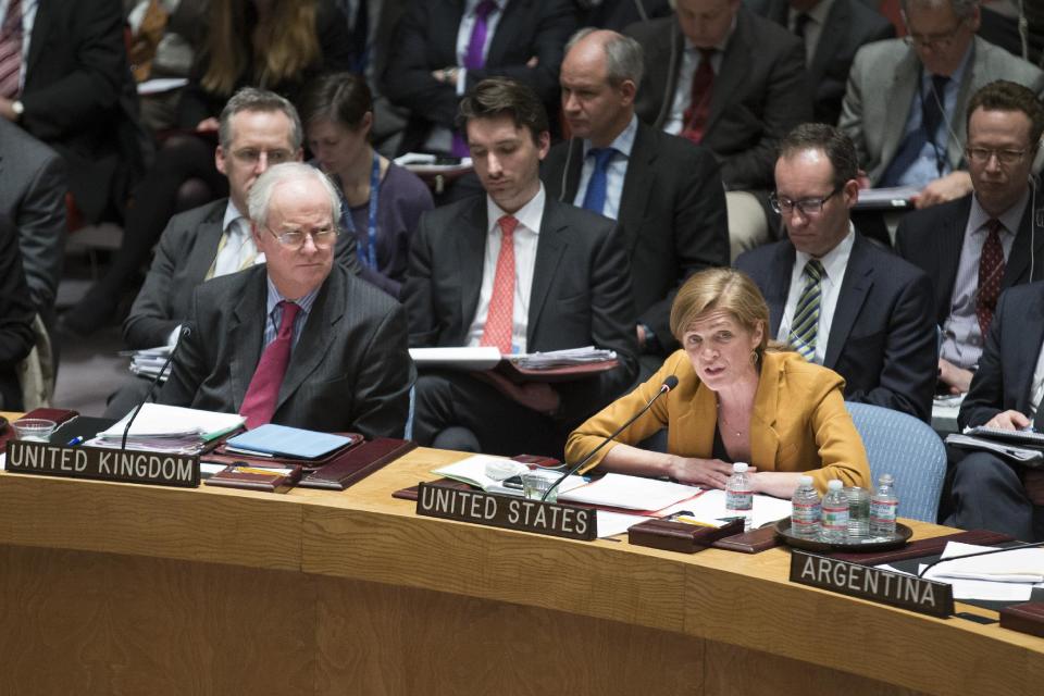 United States U.N. Ambassador Samantha Power, right, speaks alongside United Kingdom U.N. Ambassador Mark Lyall Grant, left, during a U.N. Security Council meeting on the Ukraine crisis, Thursday, March 13, 2014, at United Nations headquarters. (AP Photo/John Minchillo)