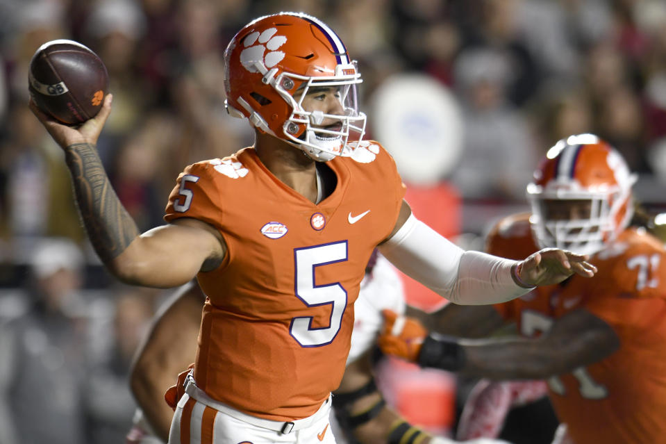 Clemson quarterback DJ Uiagalelei looks for a receiver during the first half of the team's NCAA college football game against Boston College, Saturday, Oct. 8, 2022, in Boston. (AP Photo/Mark Stockwell)