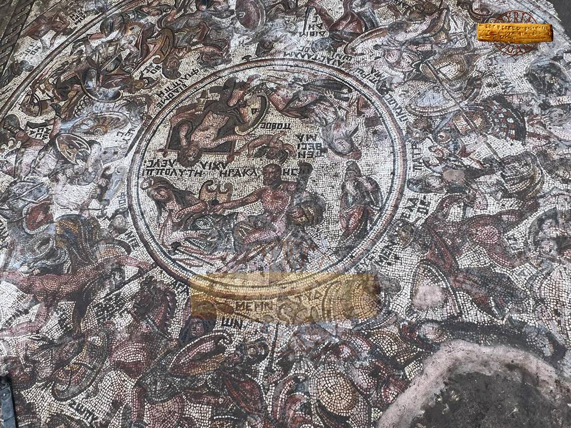 The mosaic depicts scenes from Greek and Roman mythology.