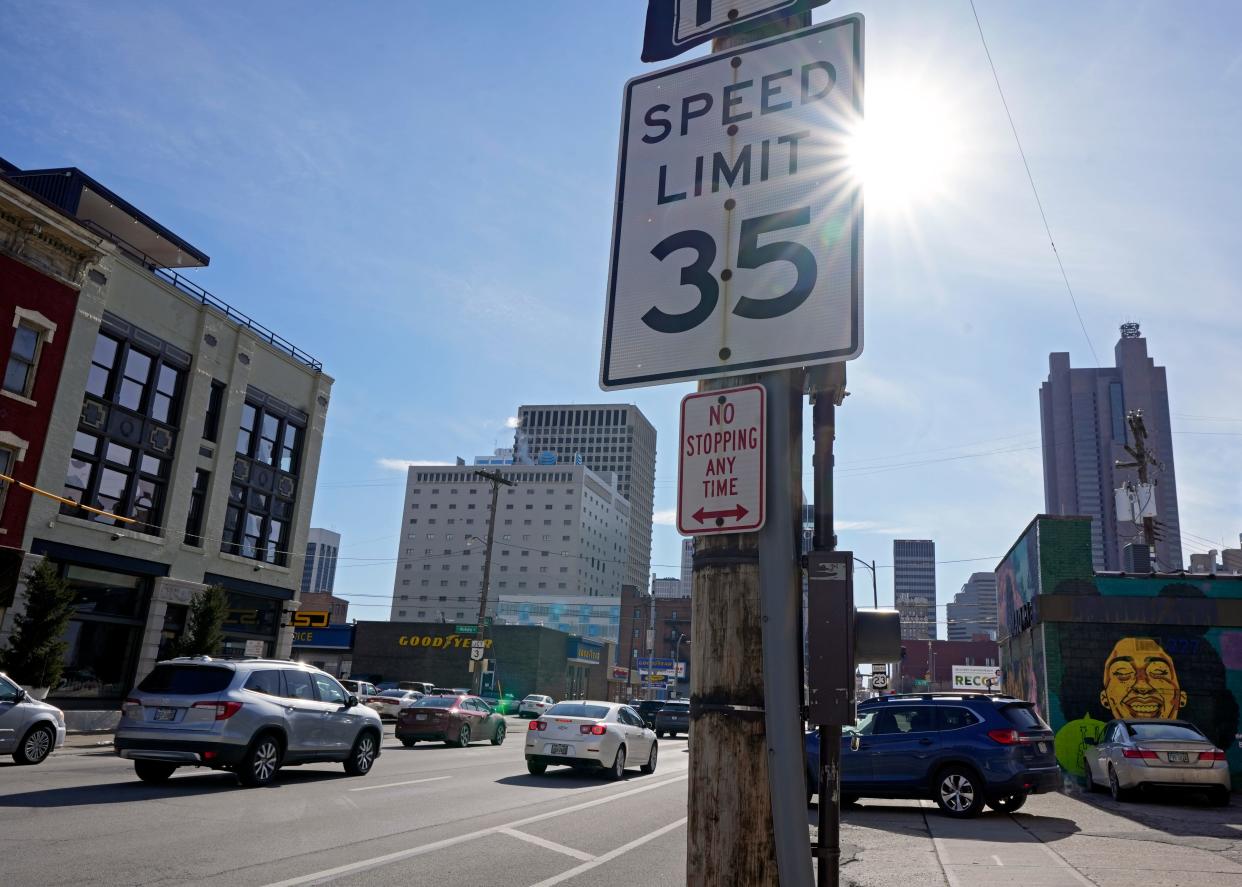 Cars drive south into downtown Columbus on 4th Street. The city of Columbus plans to set speeds on Downtown streets to 25 miles per hour.