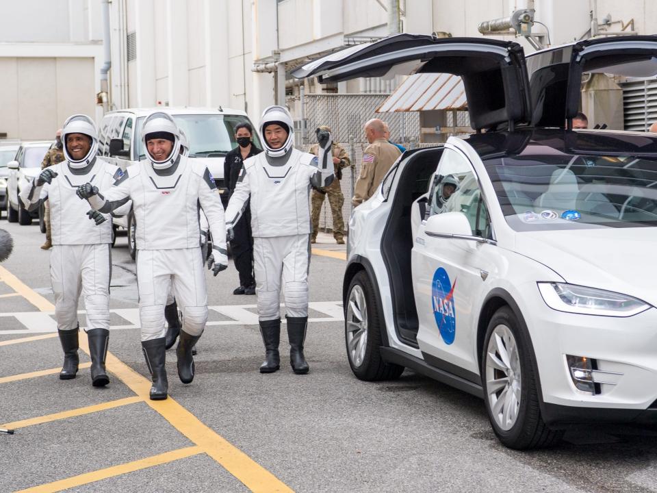 crew 1 nasa jaxa astronauts tesla electric car wave waving launch practice kennedy space center cape canaveral florida november 2020 NHQ202011120006_orig